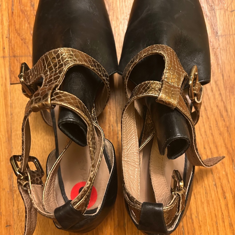 Dark brown leather booties, open sided  with textured bronze straps
